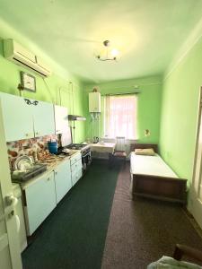 Postel nebo postele na pokoji v ubytování NunSon Guest House