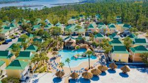 an aerial view of a resort with a pool and resort at Boogie Man 36C By Pkrm in Pensacola
