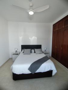 Postel nebo postele na pokoji v ubytování Villa Harena