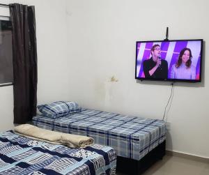 Postel nebo postele na pokoji v ubytování Apartamento Aparecida do norte