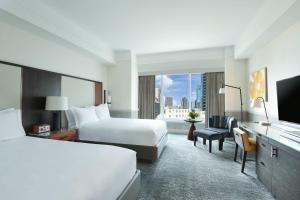 Postel nebo postele na pokoji v ubytování The Ritz-Carlton, Boston