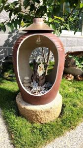 Aed väljaspool majutusasutust Plum Green Homestay