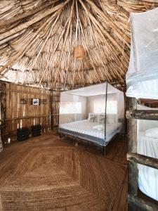 Wachakyta Ecolodge客房内的一张或多张床位