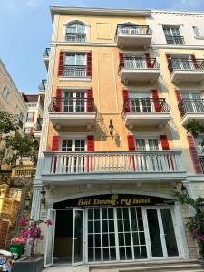 a tall building with ahm drugs hotel at Hai Duong PQ Hotel in Phu Quoc