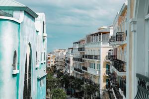 a view of a city street with tall buildings at Hai Duong PQ Hotel in Phu Quoc