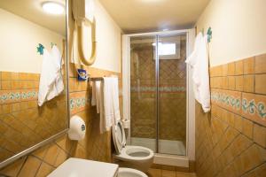 Koupelna v ubytování Hotel Sole