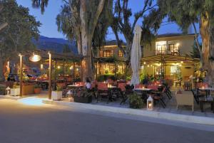 A restaurant or other place to eat at Enalion Hotel