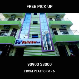 a building with a sign on the side of it at Railview inn Bhubaneswar in Bhubaneshwar