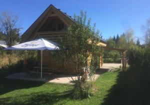 Vonkajšia záhrada v ubytovaní Faaakersee Familyhouse - mit PrivatStrand- Seeblick