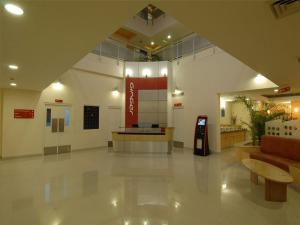 a lobby of a hospital with a gas station at Ginger Hotel Manesar in Gurgaon