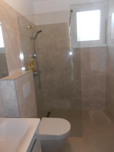 Koupelna v ubytování Apartment Steblaj