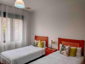 En eller flere senge i et værelse på casa patricia