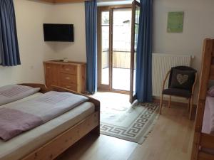 Postel nebo postele na pokoji v ubytování Apartment Telser