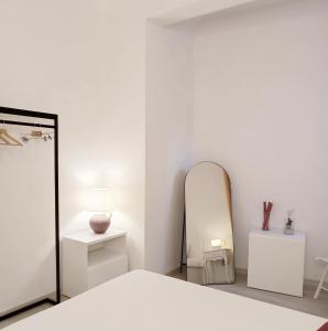 Ένα ή περισσότερα κρεβάτια σε δωμάτιο στο Handy House