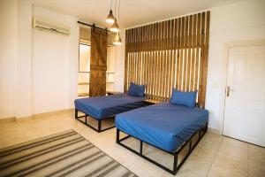 Katil atau katil-katil dalam bilik di Spacious & Styling Duplex 6 BR Villa For Friends and Family