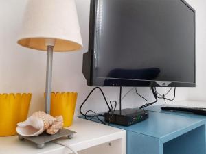 TV a/nebo společenská místnost v ubytování Apartmani Vrančić