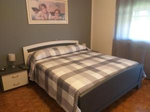 Postel nebo postele na pokoji v ubytování B&B DA ROBERTINO