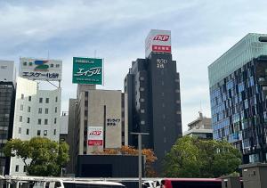 a group of buildings in a city at TKP Sunlife Hotel in Fukuoka