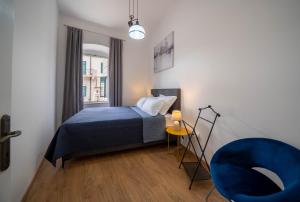 Tempat tidur dalam kamar di Main Square View