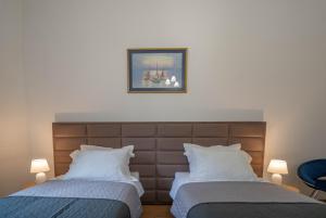 Tempat tidur dalam kamar di Main Square View