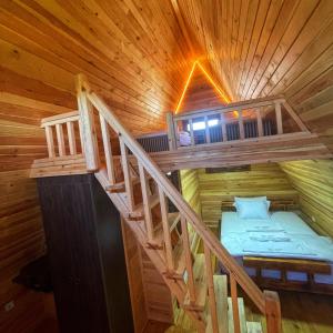 an overhead view of a bunk bed in a log cabin at Verde Blu Bungalow in Edremit