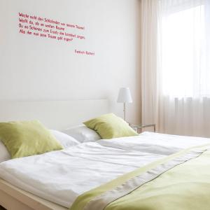 Łóżko lub łóżka w pokoju w obiekcie Hotel Villa Rückert