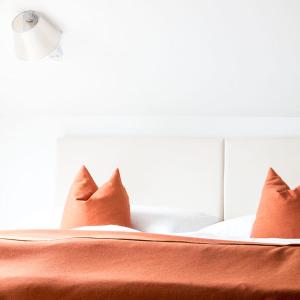 Łóżko lub łóżka w pokoju w obiekcie Hotel Villa Rückert