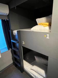 Postel nebo postele na pokoji v ubytování Rhodes Otsuka Hotel