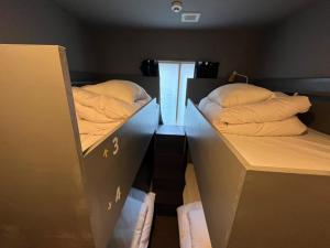 Postel nebo postele na pokoji v ubytování Rhodes Otsuka Hotel