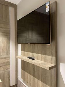 a flat screen tv on a wall at mass paradise2 in Aqaba