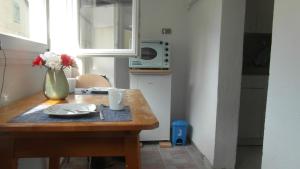 Kuchyň nebo kuchyňský kout v ubytování Apartment Stella