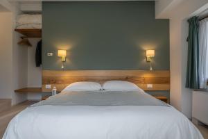Cascina Bagaggera客房内的一张或多张床位