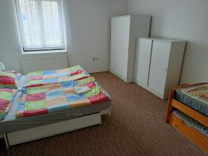 Postel nebo postele na pokoji v ubytování Penzion Nová Ves
