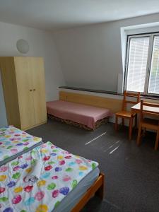 Postel nebo postele na pokoji v ubytování Penzion Nová Ves