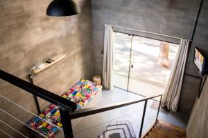 Cama o camas de una habitación en Loft com vista para mata!