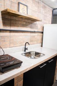 Una cocina o zona de cocina en Loft com vista para mata!