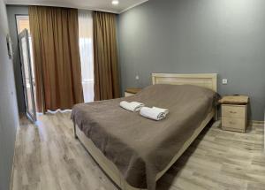 Voodi või voodid majutusasutuse Hotel Vardzia Terrace toas
