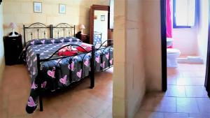 Postel nebo postele na pokoji v ubytování B&B La Nicchiarica
