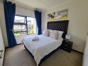 Ένα ή περισσότερα κρεβάτια σε δωμάτιο στο V&S Apartments - Loft Apartment in Fourways, Johannesburg +26 φωτογραφίες