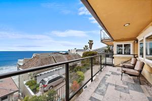 a balcony with a view of the ocean at Villa Leone at the Retreat in Laguna Beach in Laguna Beach