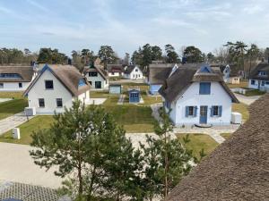 arial view of a village with white houses at Min Droom Usedom in Zirchow