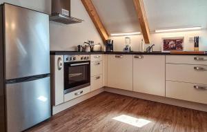 Kuchyň nebo kuchyňský kout v ubytování Ferienwohnung Röbel in Zirtow + 3 fotografie
