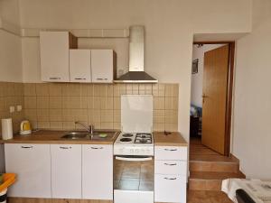 Kuchyň nebo kuchyňský kout v ubytování Sea view suite Mateo