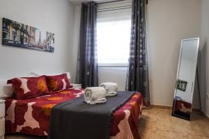 Ένα ή περισσότερα κρεβάτια σε δωμάτιο στο Los Abrigos Relax Apartment