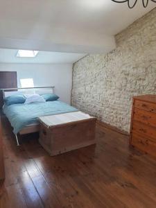 Posteľ alebo postele v izbe v ubytovaní Appartement duplex 4 personnes