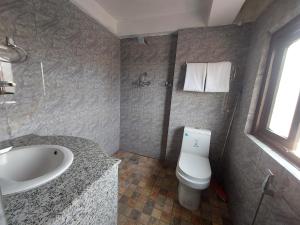 Koupelna v ubytování Hotel Garuda