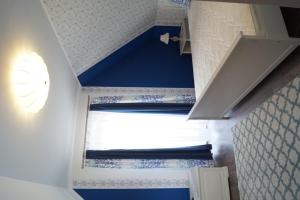 Postel nebo postele na pokoji v ubytování Boróka Apartman Lenti