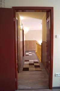Postel nebo postele na pokoji v ubytování Boróka Apartman Lenti