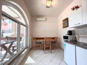 Kuchyň nebo kuchyňský kout v ubytování Apartments Tereza