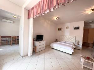 Postel nebo postele na pokoji v ubytování Apartments Tereza
